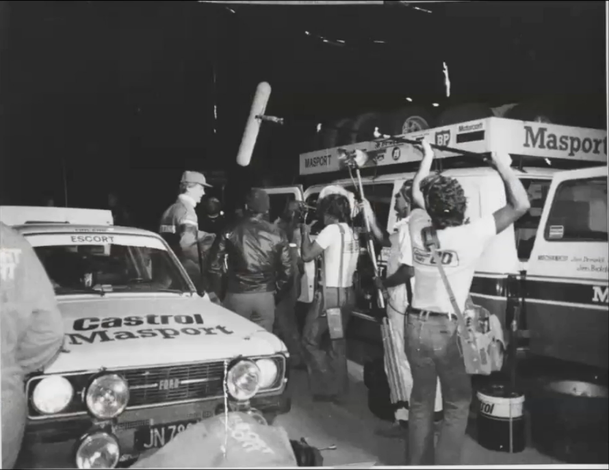 Photo showing the crush of news crews covering a live event.