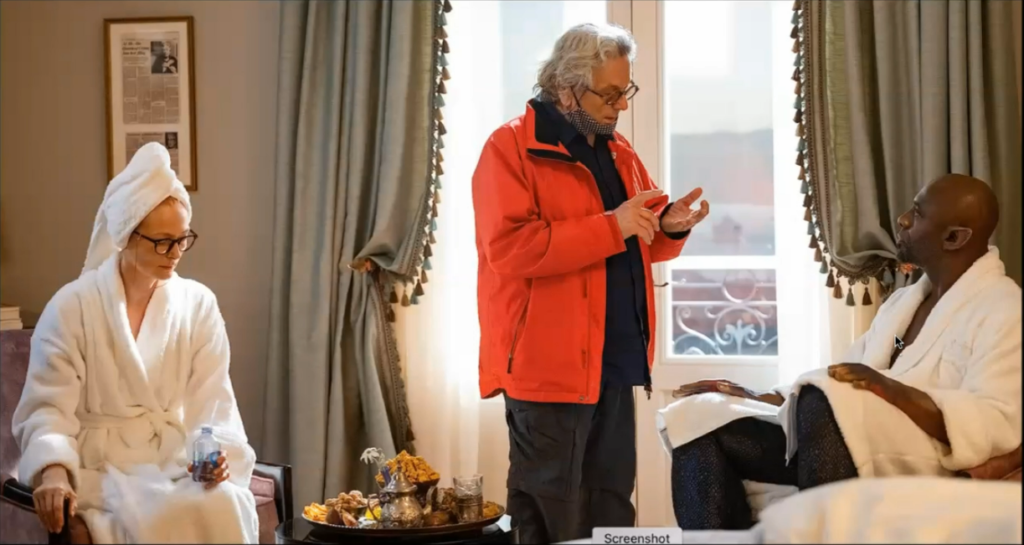 Photo of Director George Miller on the set of Three Thousand Year of Longing with the lead actors Hilda Swinton and Idris Elba