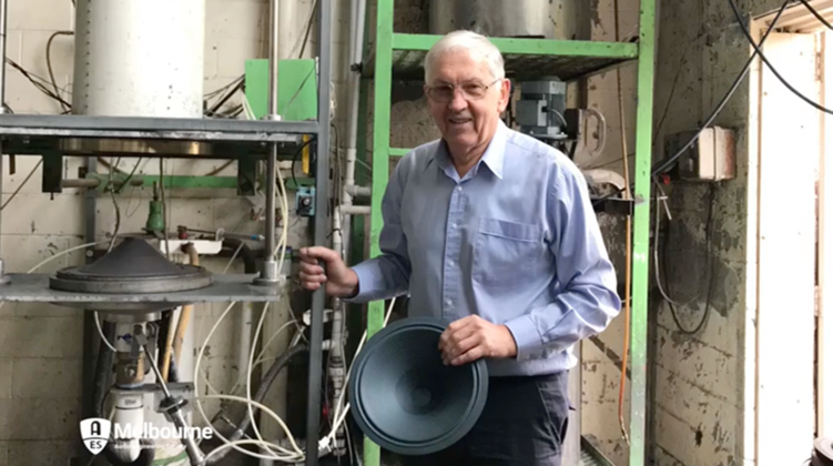 A photo of Michail in his factory during the cone forming process