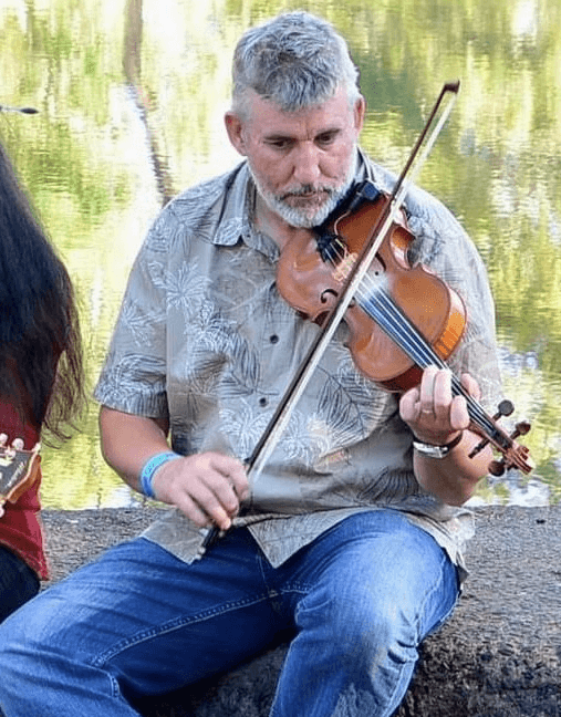 Patrick Evans playing a violin